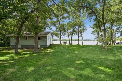 Discover a rare opportunity to own nearly an acre on Lake Julia - photo 2