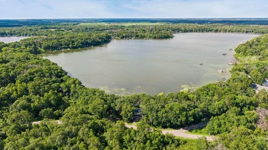Discover a rare opportunity to own nearly an acre on Lake Julia - photo 6