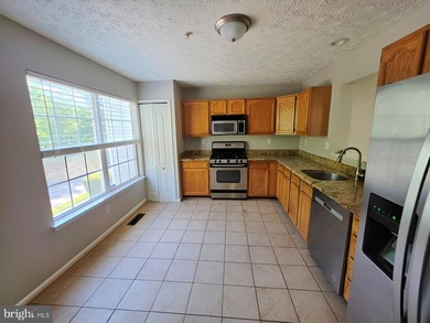 This end unit townhouse features a loft that provides flexible - photo 8