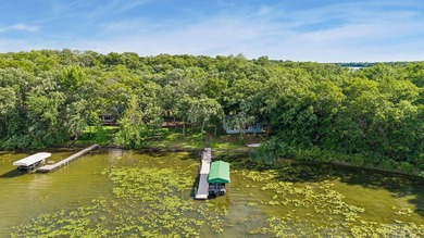 Discover a rare opportunity to own nearly an acre on Lake Julia - photo 9