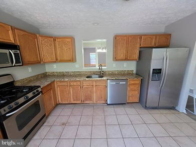 This end unit townhouse features a loft that provides flexible - photo 9