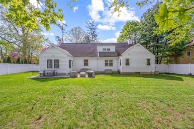 Welcome to this fully renovated gem located in the highly - photo 2