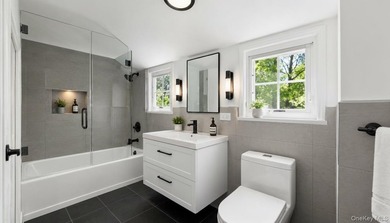 Welcome to this fully renovated gem located in the highly - photo 9