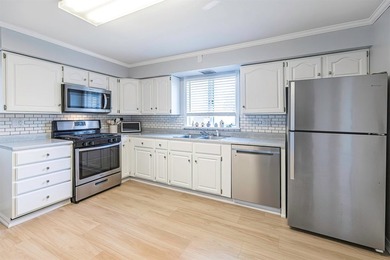 This quality, solid brick, Cape Cod home is just a few minutes - photo 14