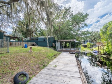 Located in the waterfront community of Kerr Shores, this - photo 2