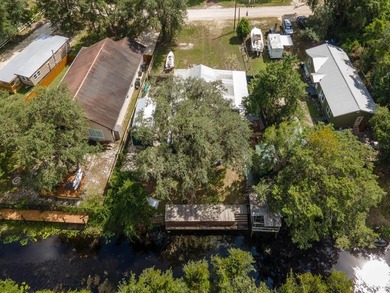 Located in the waterfront community of Kerr Shores, this - photo 3