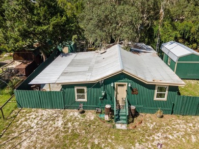 Located in the waterfront community of Kerr Shores, this - photo 4