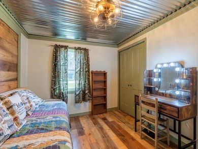Located in the waterfront community of Kerr Shores, this - photo 9
