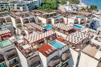 Penthouse unit located in Aldea Thai, a resort-style beachfront - photo 3