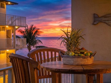 Beautiful and fully remodeled end unit that sits south of the - photo 1