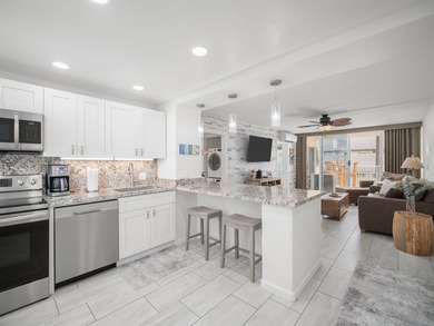 Beautiful and fully remodeled end unit that sits south of the - photo 3
