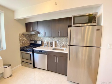 Spacious and sun-filled 1-bedroom condominium for sale in the - photo 2