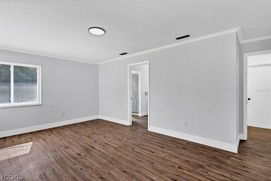 From the light fixtures to the flooring, this home has been - photo 8