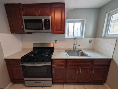 Nicely Renovated Single Family Row Home. Two Story, Three - photo 6