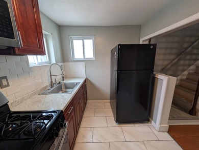 Nicely Renovated Single Family Row Home. Two Story, Three - photo 8