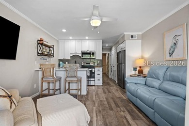 Completely remodeled from the studs, this FIRST-FLOOR oceanfront - photo 2