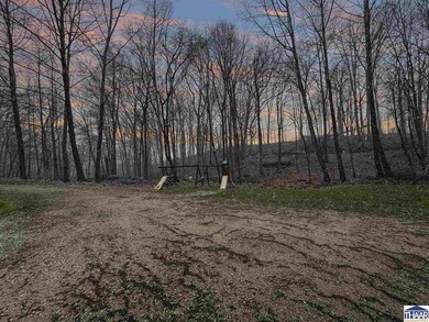 Nestled at the end of a quiet lane on 2 private acres, this