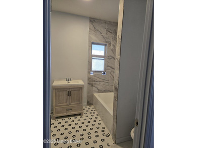 Experience the ultimate in city living with this meticulously - photo 5