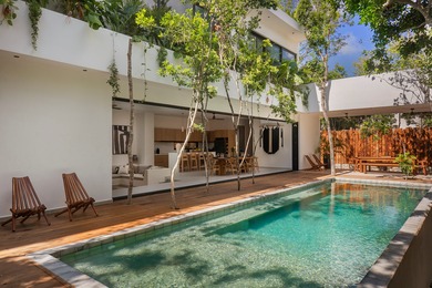 Discover the ultimate blend of modern design and raw tropical - photo 1