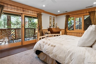 Perched among the trees in sought-after Moonridge, this - photo 11