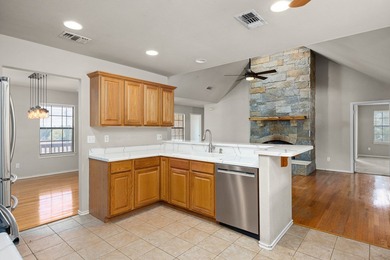 Well maintained 4-bedroom, 3-bath single-level home on 1.85