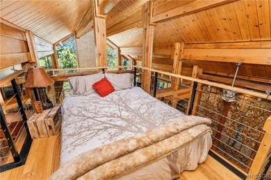 Perched among the trees in sought-after Moonridge, this - photo 13