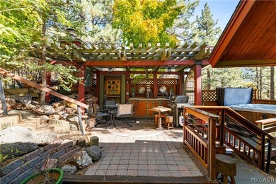 Perched among the trees in sought-after Moonridge, this - photo 15