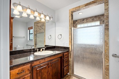 Well maintained 4-bedroom, 3-bath single-level home on 1.85