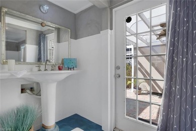 The Blue Cottage is a coastal mid-century showpiece set along - photo 19