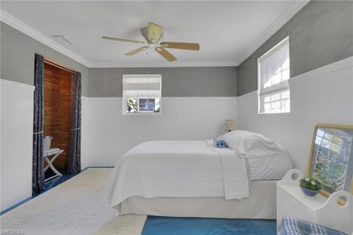 The Blue Cottage is a coastal mid-century showpiece set along - photo 21