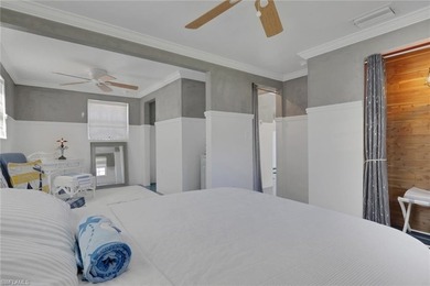 The Blue Cottage is a coastal mid-century showpiece set along - photo 22