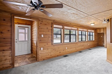 Well maintained 4-bedroom, 3-bath single-level home on 1.85