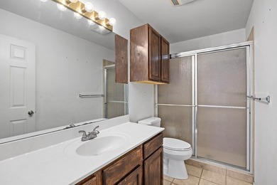 Well maintained 4-bedroom, 3-bath single-level home on 1.85