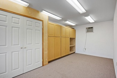 Well maintained 4-bedroom, 3-bath single-level home on 1.85