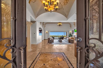 Perched high above the coastline within the private gated - photo 3