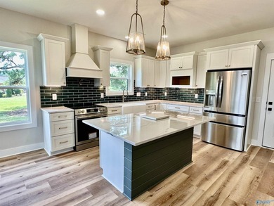 Experience turnkey waterfront living in this brand-new 3-bedroom - photo 2