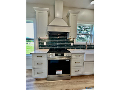 Experience turnkey waterfront living in this brand-new 3-bedroom - photo 3
