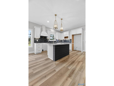 Experience turnkey waterfront living in this brand-new 3-bedroom - photo 5