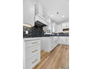 Experience turnkey waterfront living in this brand-new 3-bedroom - photo 8