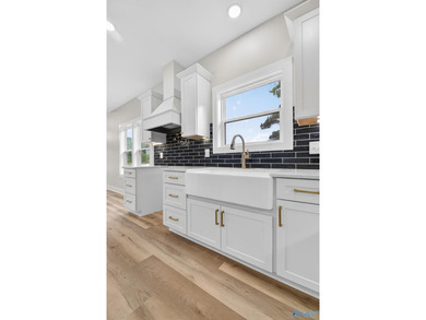 Experience turnkey waterfront living in this brand-new 3-bedroom - photo 9