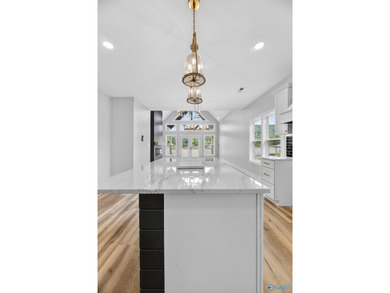 Experience turnkey waterfront living in this brand-new 3-bedroom - photo 10