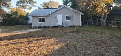 Investor opportunity! Fixer-upper on a double lot. Home features - photo 1