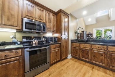 Located in Reynolds Landing, this lakeview home offers access to - photo 11