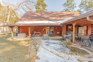 This stunning Satterwhite log home offers 2,550 square feet of - photo 11