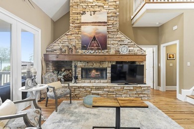 Located in Reynolds Landing, this lakeview home offers access to - photo 13