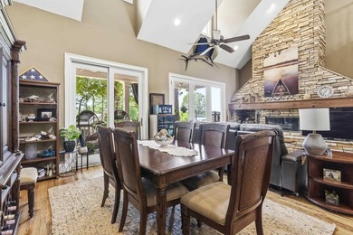 Located in Reynolds Landing, this lakeview home offers access to - photo 15