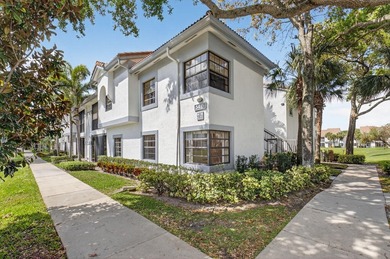 Enjoy tranquil lake views from this first-floor 3-bedroom - photo 1