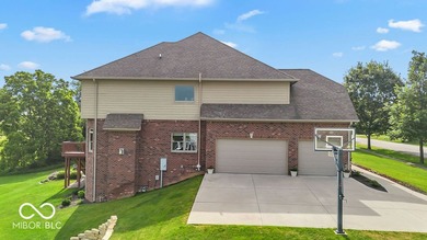 Nestled on 1.5 beautifully landscaped acres in one of - photo 2