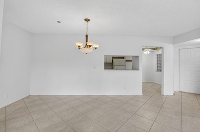 Enjoy tranquil lake views from this first-floor 3-bedroom - photo 6