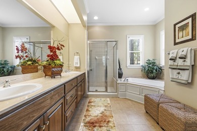 Located in Reynolds Landing, this lakeview home offers access to - photo 30